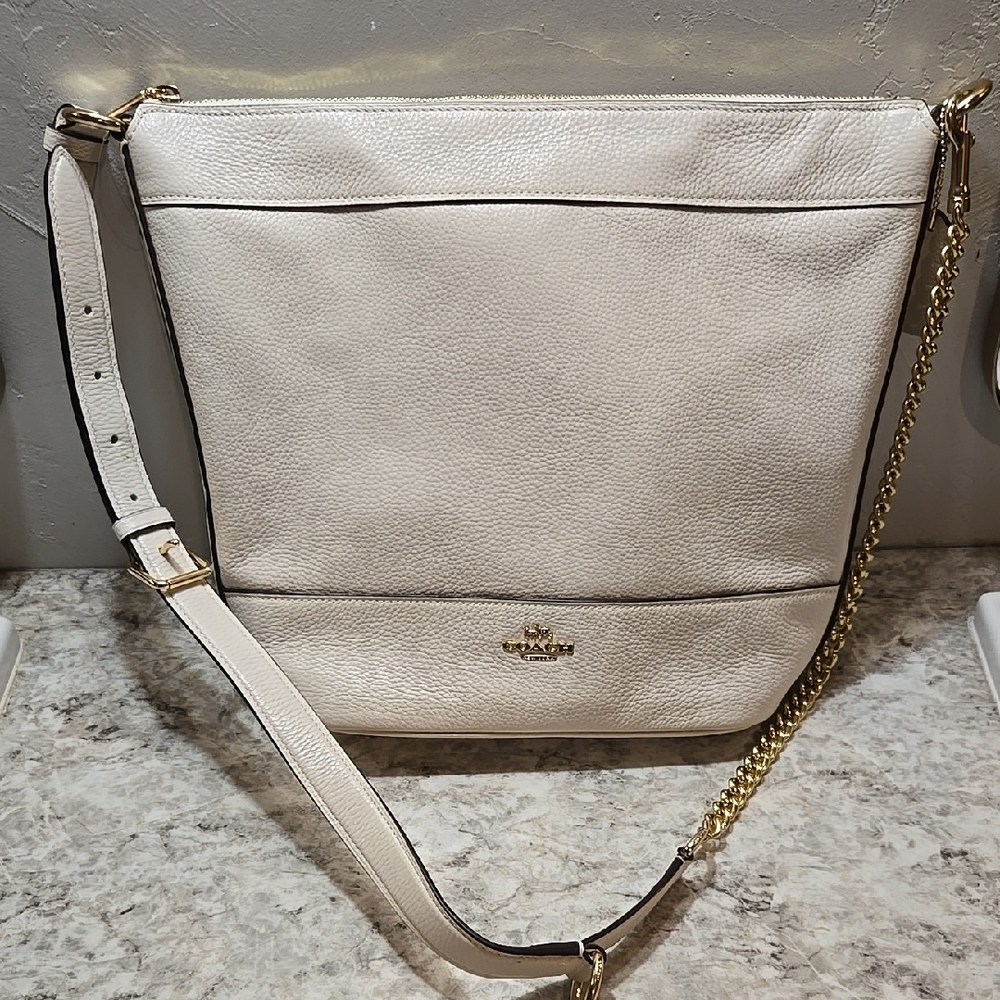 Coach White Crossbody Bag with Structured Shape and Adjustable Strap